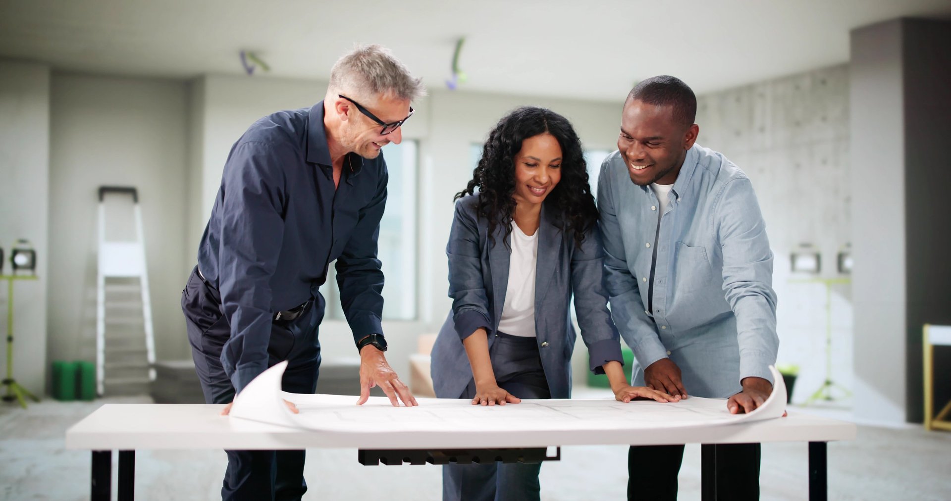 Diverse Family Discusses Renovation Plans With Real Estate Agent